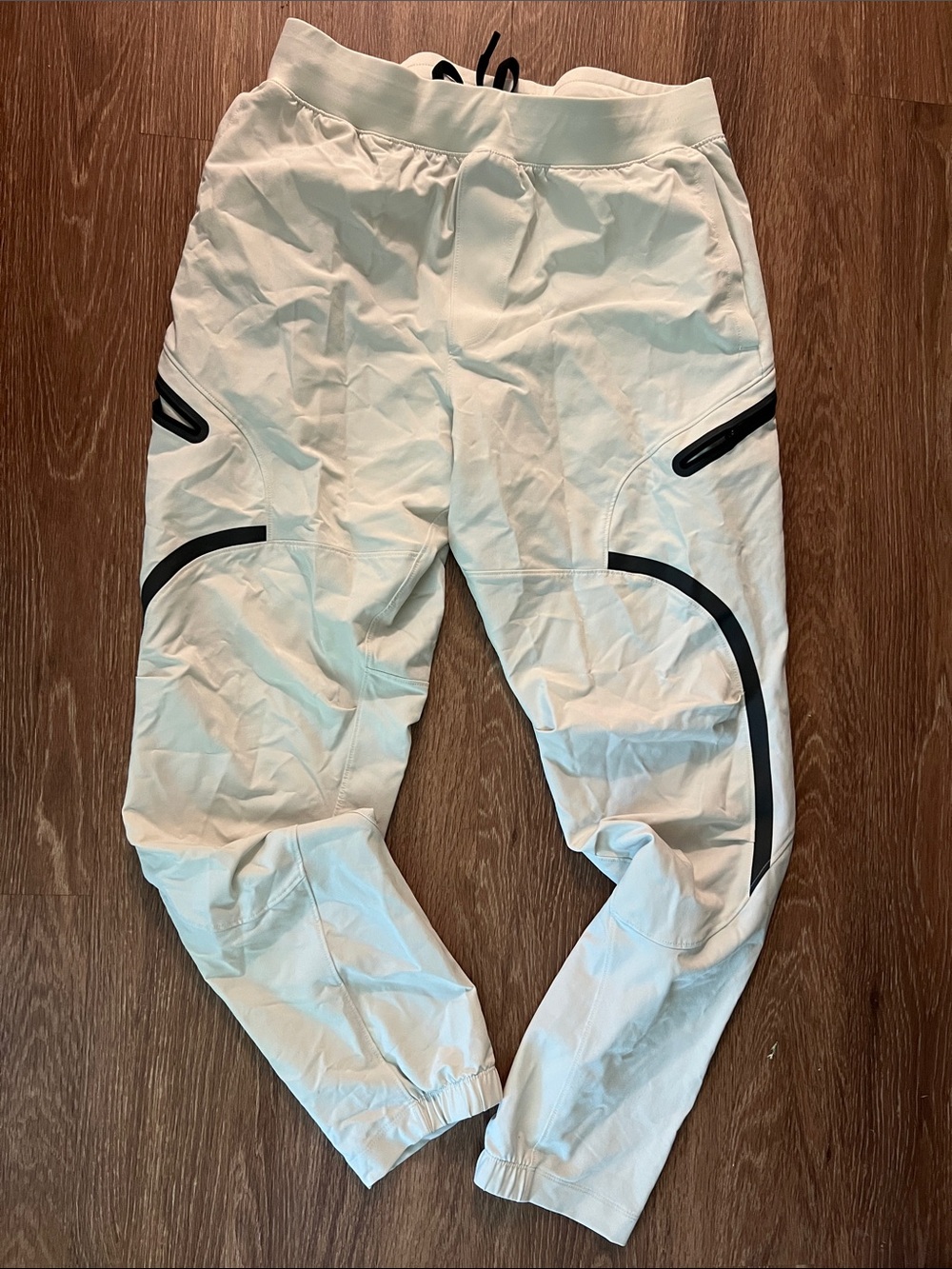 Under Armour Men’s White Athletic Jogger Pants with Black Trim
